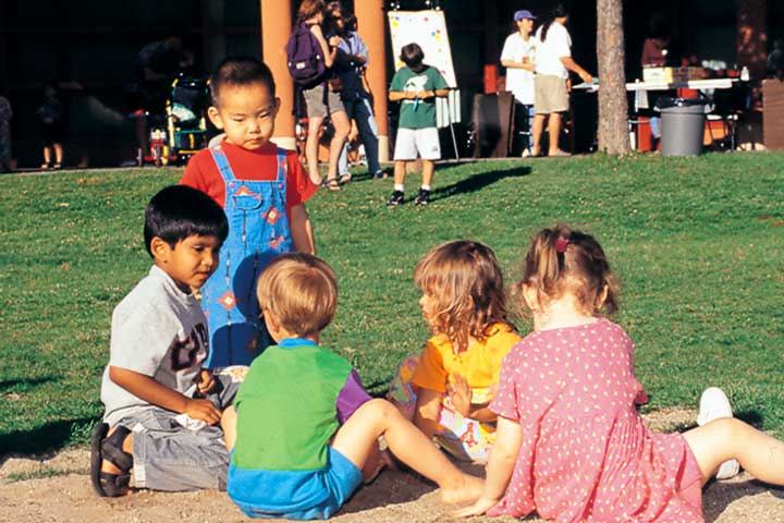 Children play at the annual Acadia Park summer barbecue, UBC.